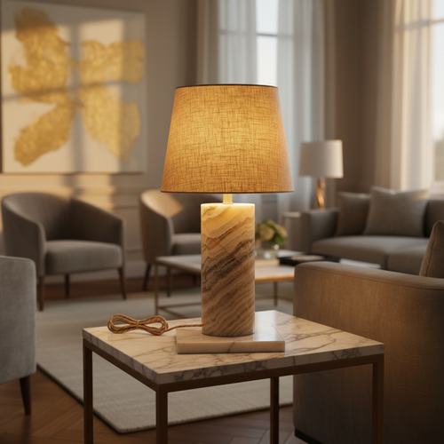 Alabaster table lamp styled on a marble side table in a luxury living room